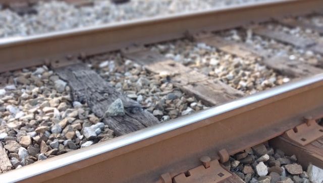 railroad tracks in a gravel bed signifying a journey